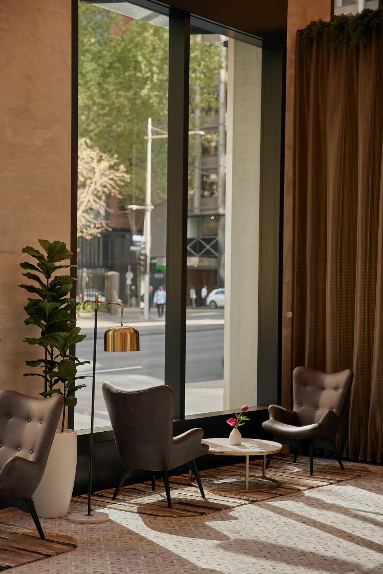 Meriton Suites Melbourne Eksteriør billede The interior of the hotel